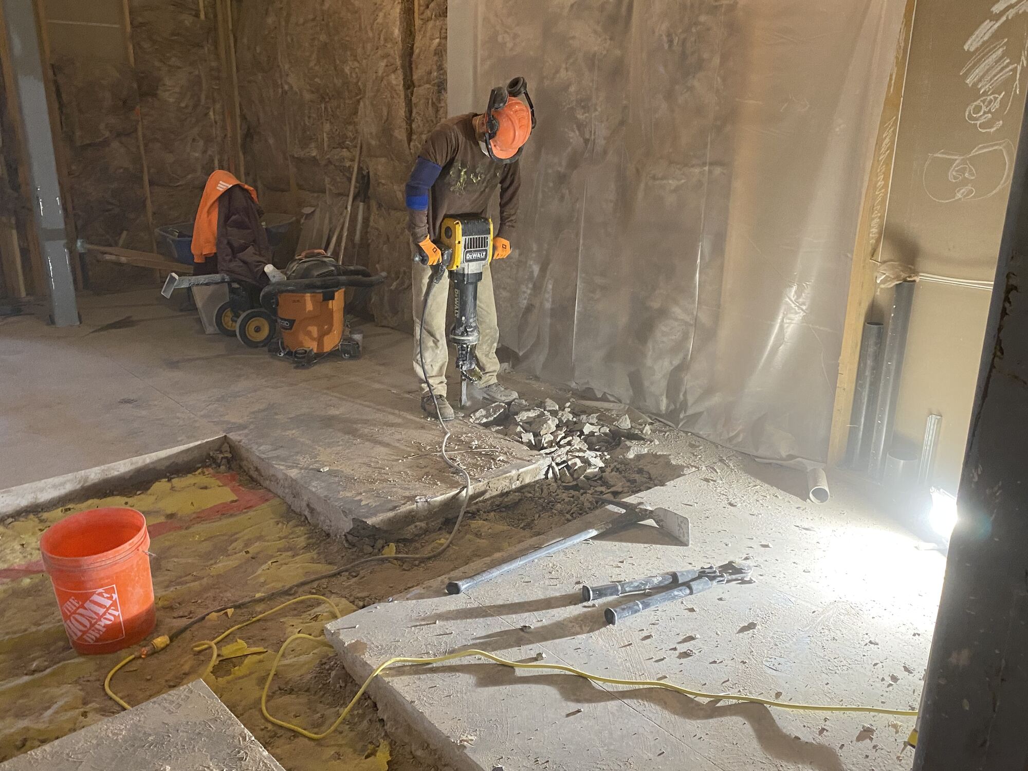 Saw cut opened through an interior concrete slab on a VALOR job